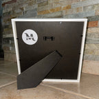 Displaying the back of the mini museum of us the medium size