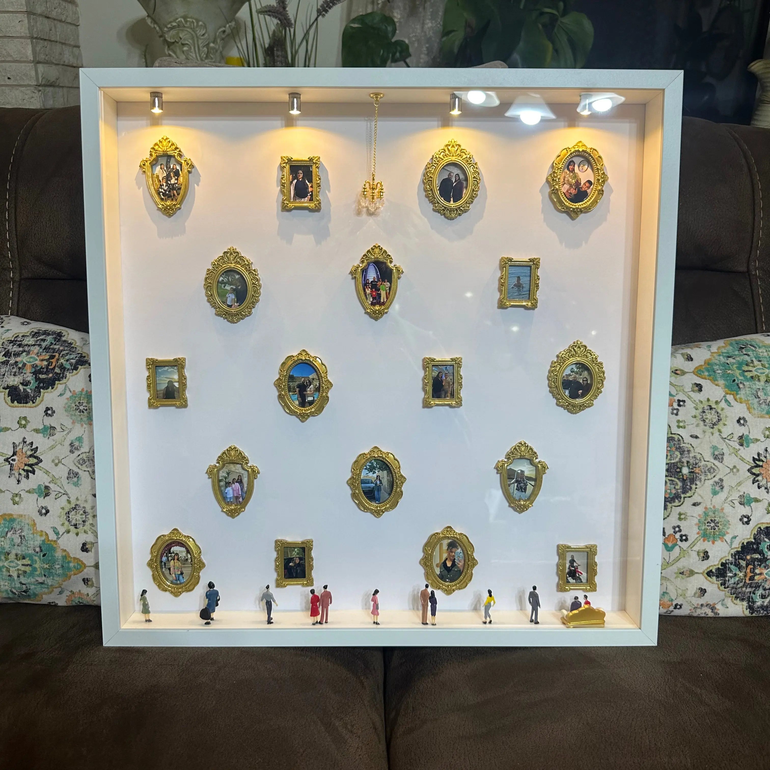 Displaying the big mini museum on a couch.